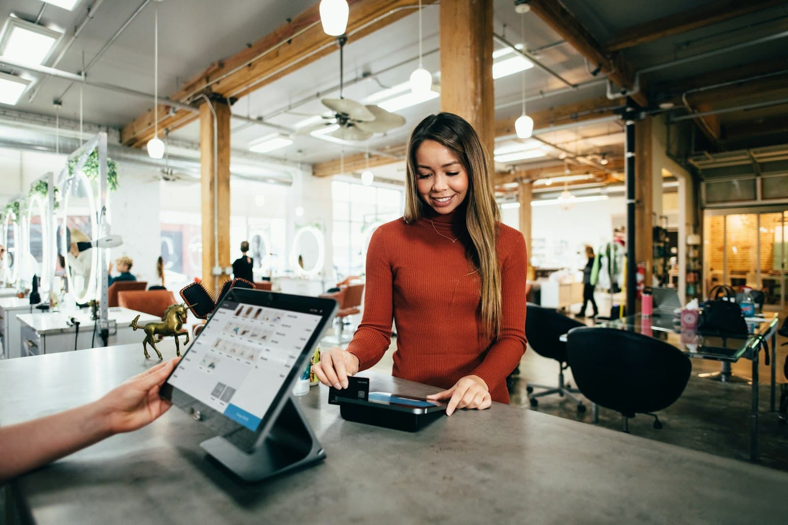 Customer paying securely by saved card instead of cash for a Georgia cleaning service
