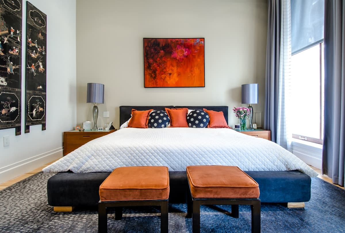 Freshly staged bedroom with hotel-quality linens after Airbnb turnover cleaning in Savannah GA